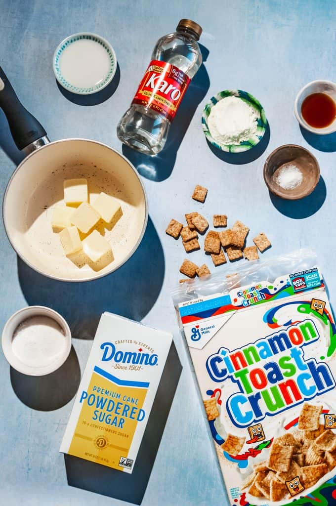 ingredients needed to make milk and cereal bars with cinnamon toast crunch: milk, corn syrup, milk powder, vanilla, salt, butter, powdered sugar, granulated sugar, cereal