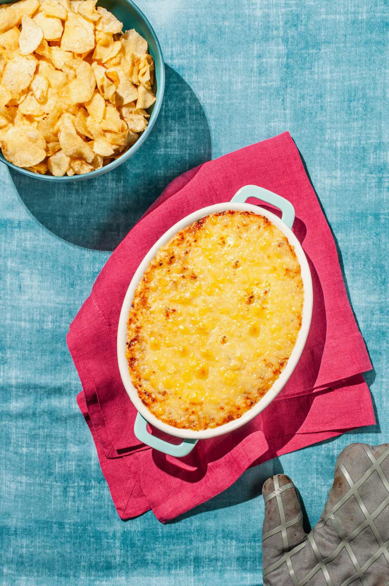 caramelized onion dip in baking dish after broiling cheese top