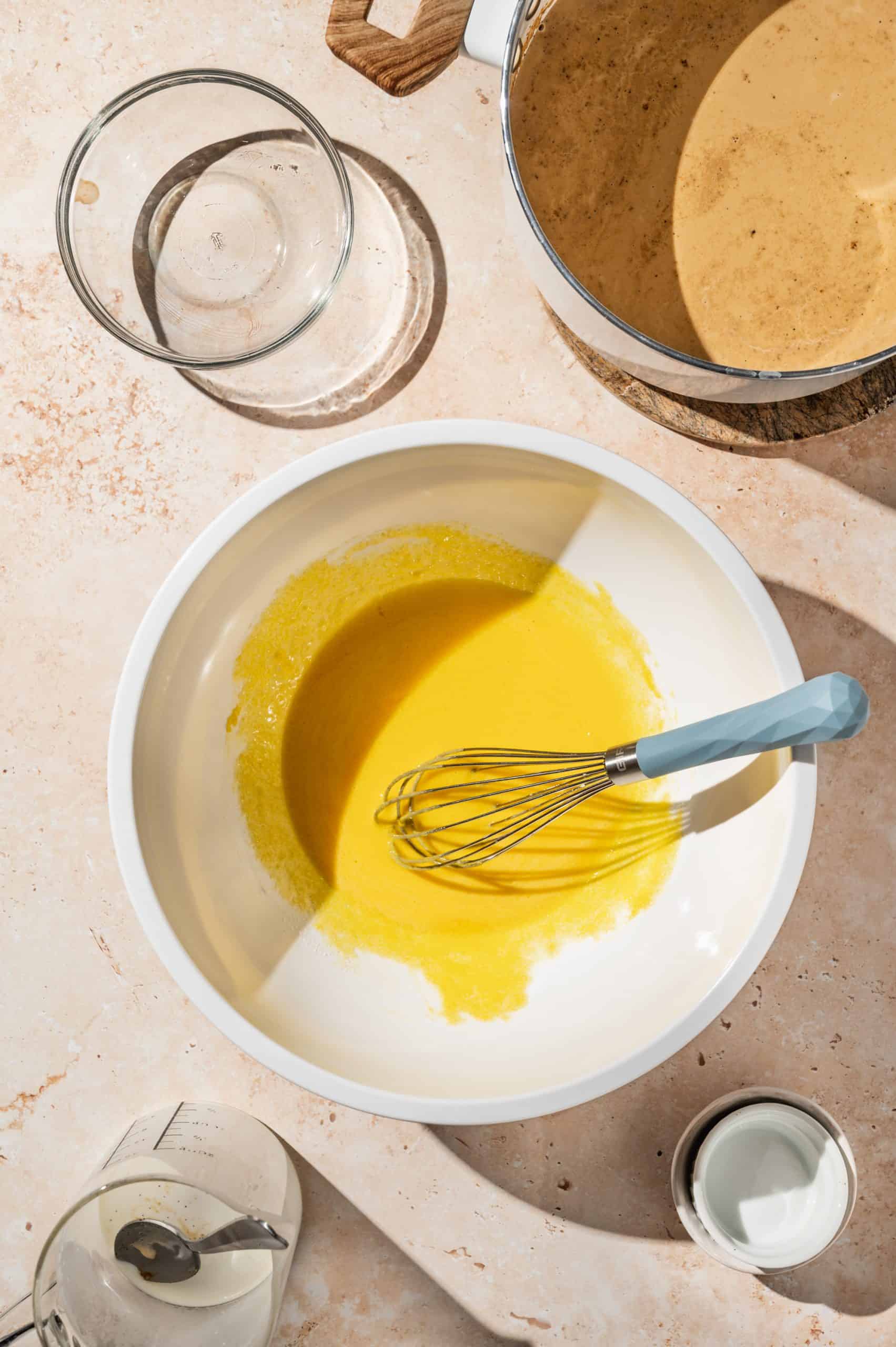 large bowl with egg yolks and sugar, whisked until smooth