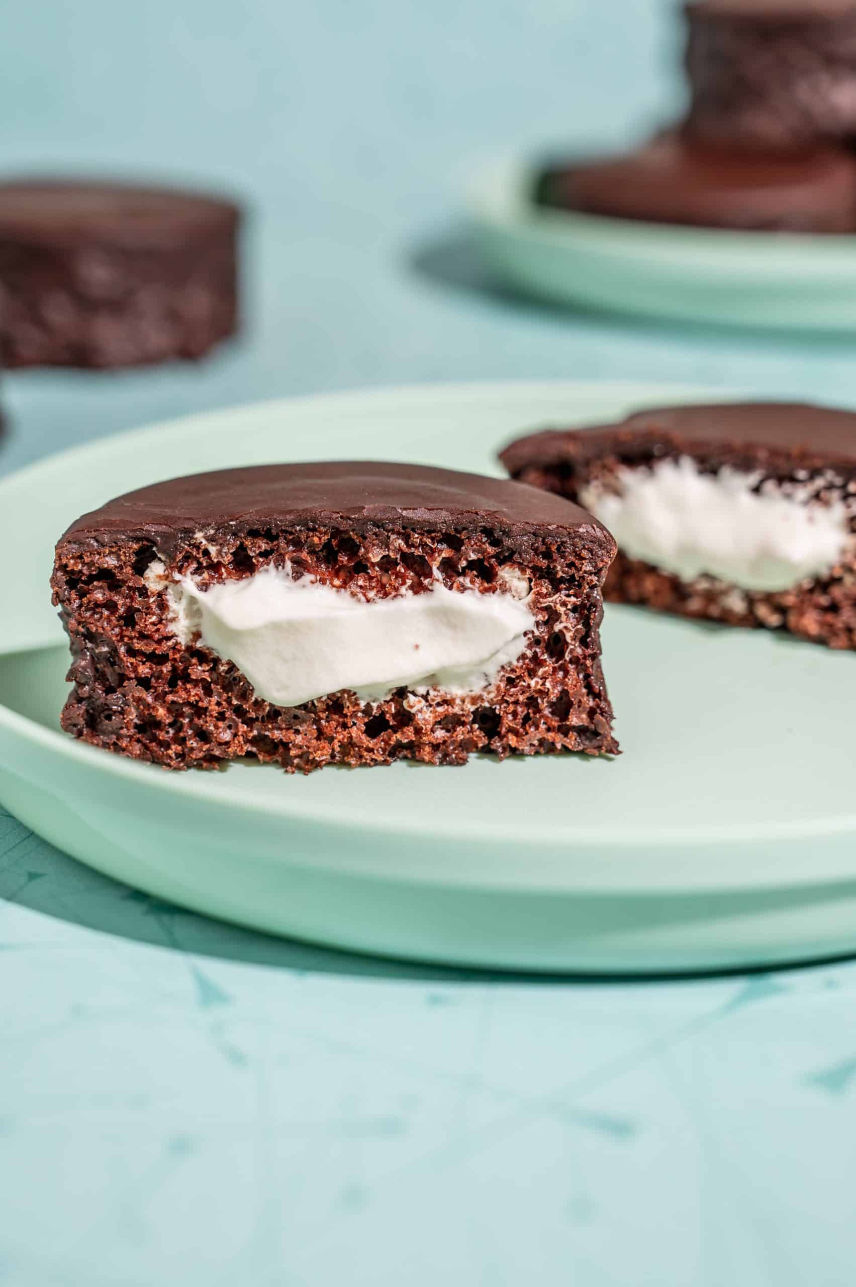 homemade ding dong on a plate, cut in half to reveal cream center