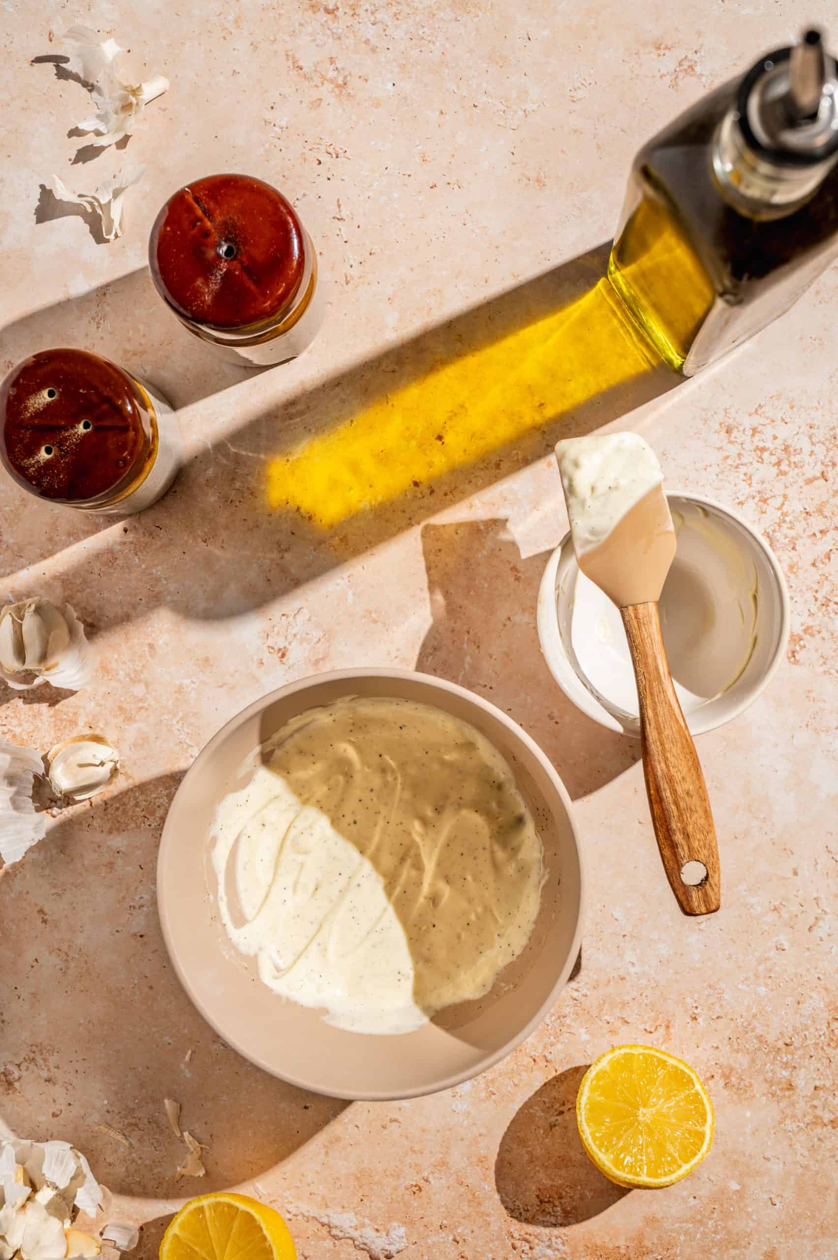 mixing bowl with homemade garlic aioli (mayonnaise, lemon juice, seasonings)