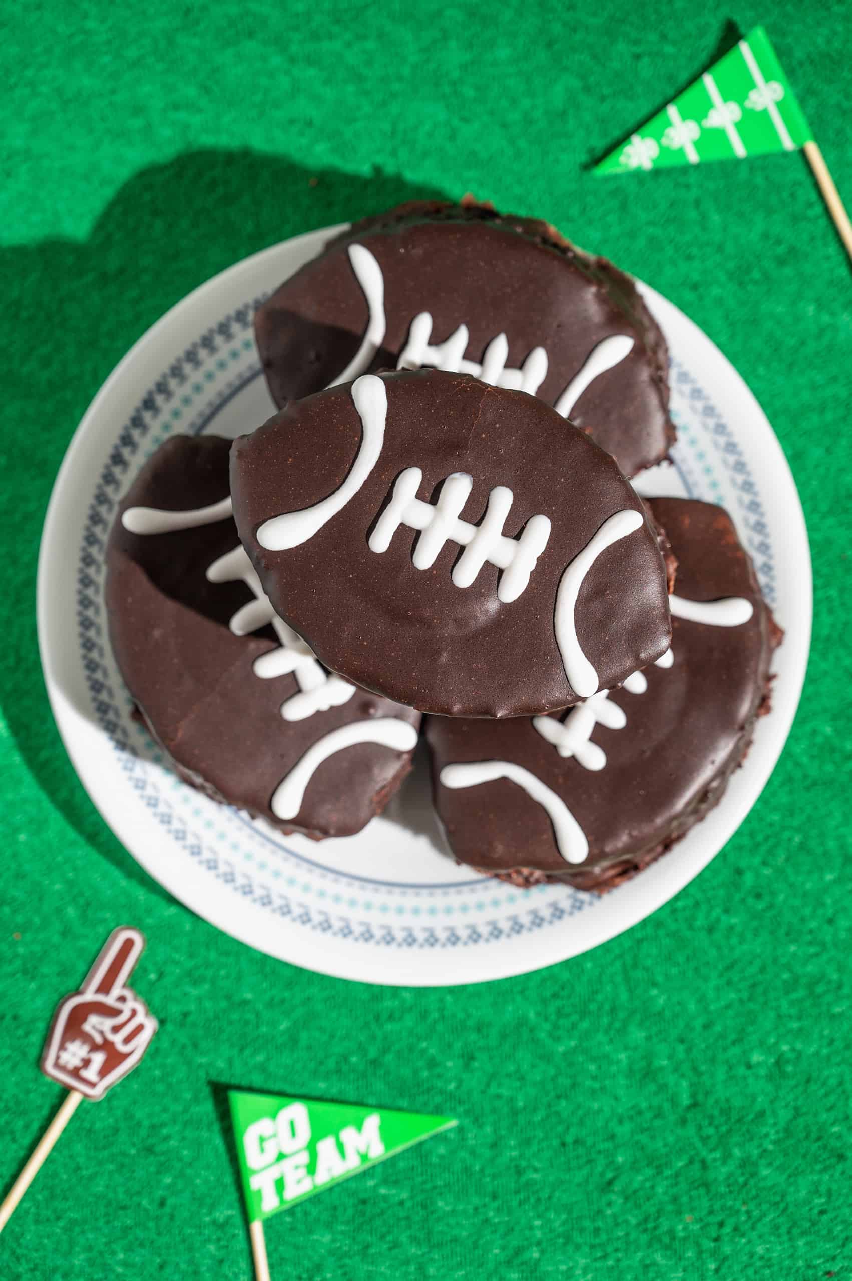 plate with 4 mini football cakes
